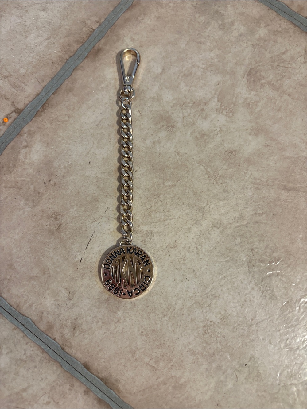 Donna Karan Silver Tone Chain Keyring or purse chain with DK Round Pendant